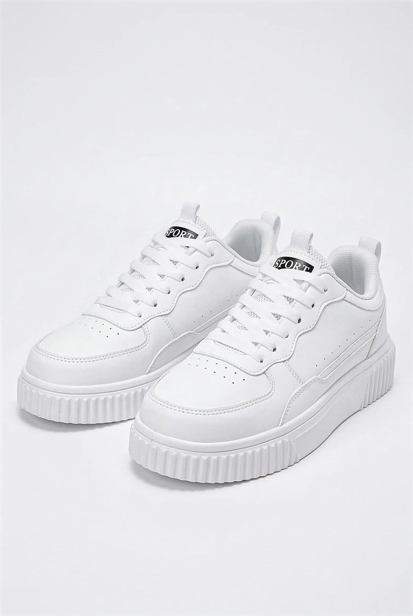 White FJØRNA women's breathable casual trainers with lightweight design, shown from a side angle on a plain background.