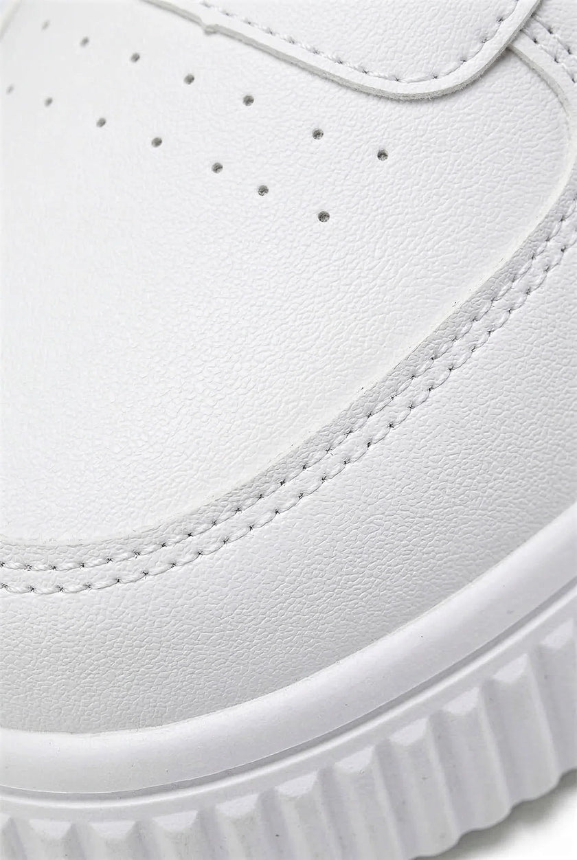White breathable FJØRNA women's casual trainers with lightweight design, ideal for everyday comfort and casual wear.