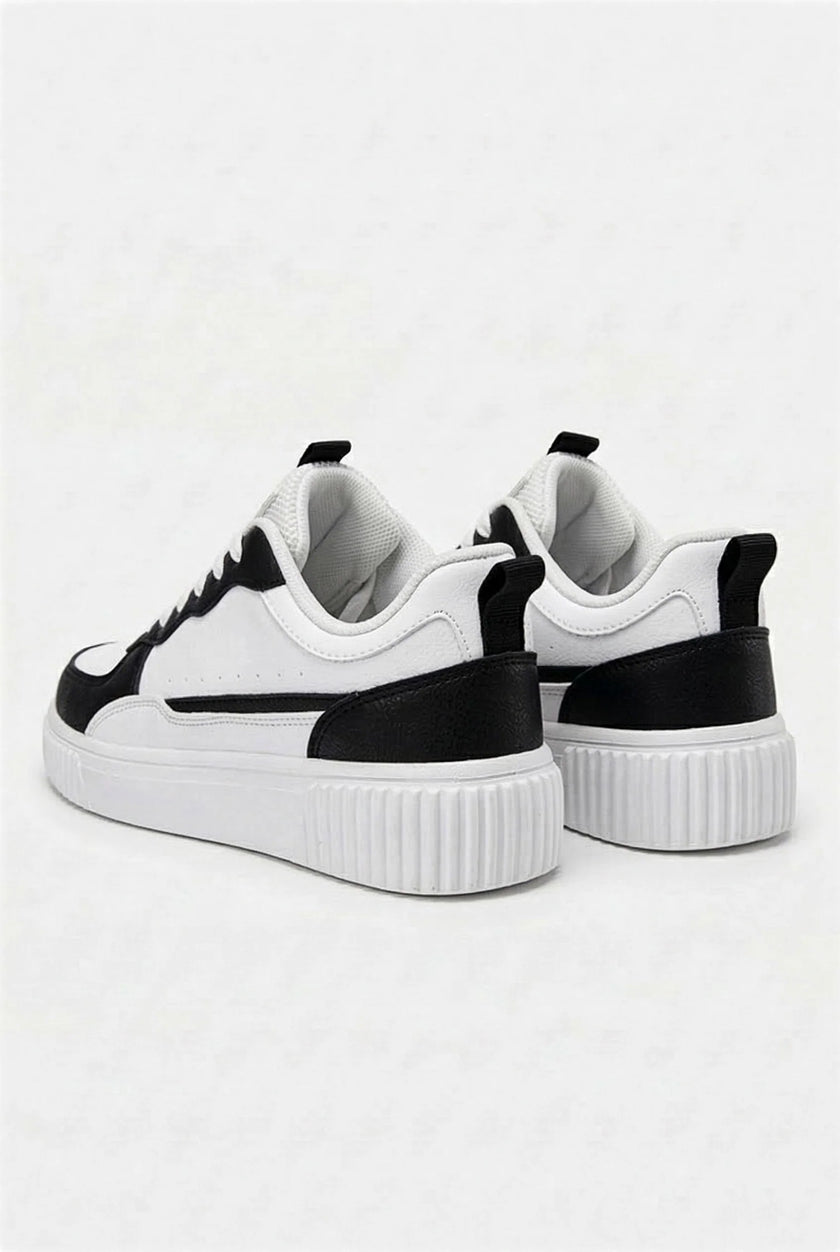 FJØRNA men's white lightweight minimalist casual sneakers, showcasing the sleek design and comfortable fit for everyday wear.