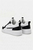 White breathable women's trainers by FJØRNA, lightweight casual sneakers with a comfortable fit and stylish design.