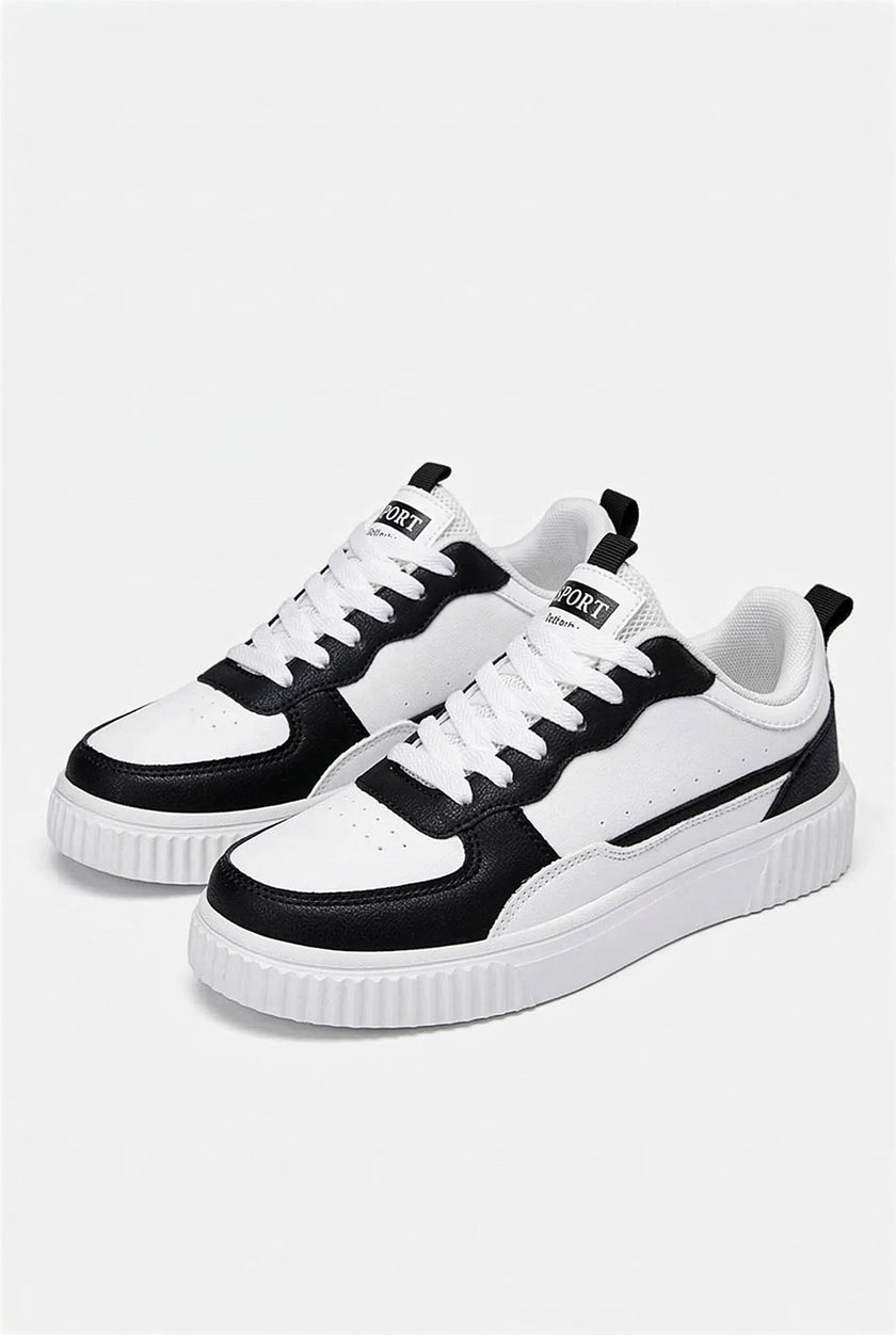 White minimalist men's trainers by FJØRNA, lightweight casual shoes with clean design, suitable for everyday wear.