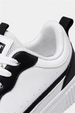 FJØRNA white men's minimalist lightweight casual sneakers, showing a side view of the shoes designed for everyday wear.