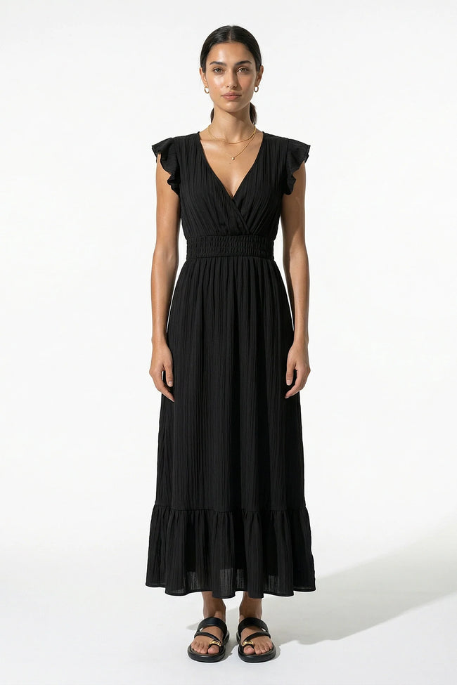 Black FJØRNA women's midi dress with flowing sleeveless design, perfect for elegant everyday wear.