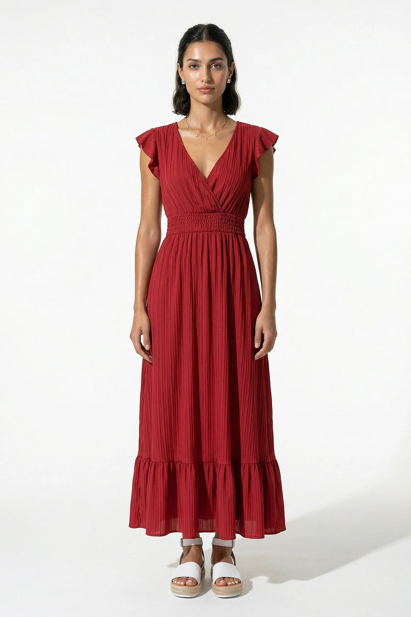 Flowing brick red FJØRNA midi dress for women, sleeveless and elegant, ideal for everyday wear and stylish occasions.