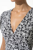 Elegant black and white floral midi dress for women by FJØRNA, featuring an A-line casual summer design.