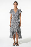 Elegant floral midi dress for women by FJØRNA featuring an A-line silhouette in black and white for casual summer wear.