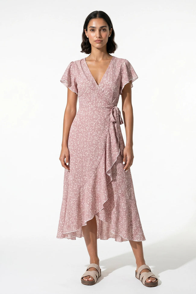 Pink floral midi dress for women by FJØRNA, featuring an elegant A-line design perfect for casual summer wear.