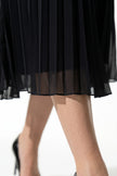 Black floral lace maxi dress for women with pleated A-line design by FJØRNA, perfect for summer occasions.