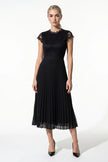 FJØRNA floral lace maxi dress for women, black, with pleated A-line design, ideal for summer occasions.