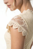 Elegant floral lace maxi dress for women by FJØRNA featuring pleated A-line design in champagne for summer occasions.