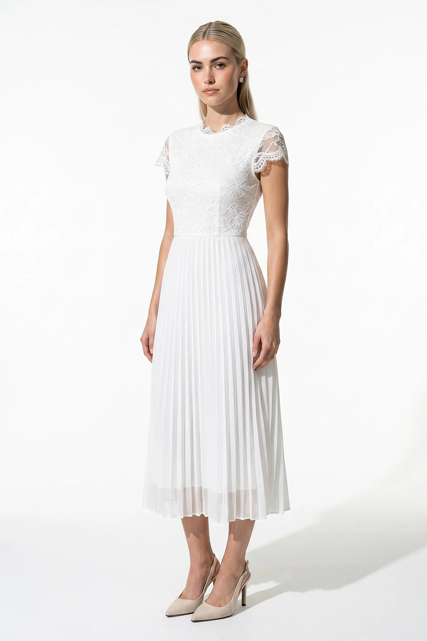 White floral lace maxi dress by FJØRNA with pleated A-line design, perfect for summer occasions.