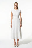 White floral lace maxi dress for women by FJØRNA featuring pleated A-line design, perfect for summer occasions.