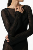 Black long sleeve maxi dress by FJØRNA featuring casual summer beach style, perfect for warm weather and relaxed occasions.