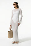 White FJØRNA maxi dress for women with long sleeves, perfect for beach casual summer wear, full-body view.