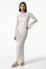 White long sleeve maxi dress for women by FJØRNA, casual summer beach dress with relaxed fit and flowing fabric.