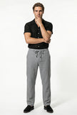 Men's lightweight grey linen trousers by FJØRNA, breathable straight fit summer pants, full-body view.