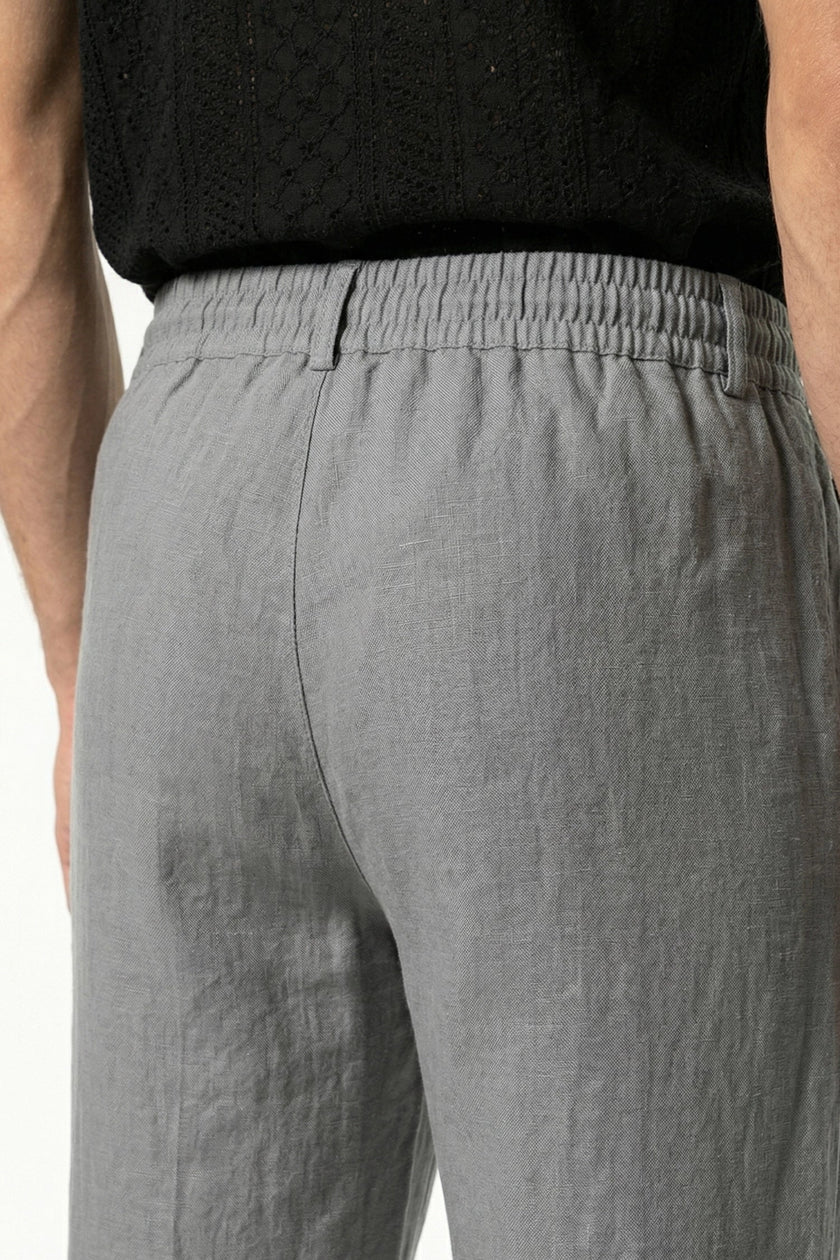 Men's lightweight linen trousers by FJØRNA, breathable straight fit summer pants in grey, suitable for warm weather.