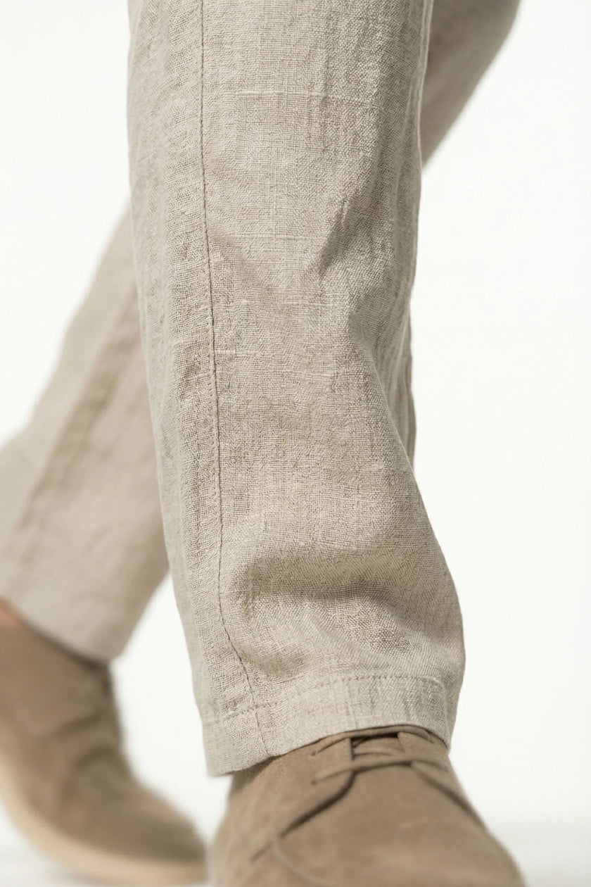 Men's lightweight linen trousers by FJØRNA in khaki, featuring a breathable straight fit design for summer wear.