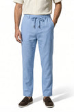 Light blue men's linen trousers by FJØRNA, breathable straight fit summer pants with lightweight fabric and relaxed style.