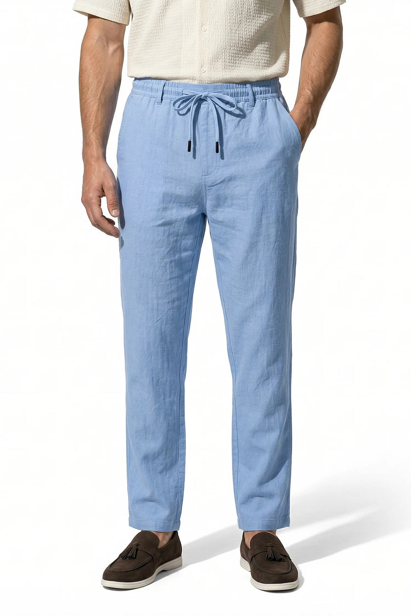 Light blue men's linen trousers by FJØRNA, breathable straight fit summer pants with lightweight fabric and relaxed style.
