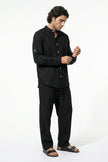 FJØRNA men's linen co-ord set with black shirt and trousers, perfect for summer, shown in full body view.