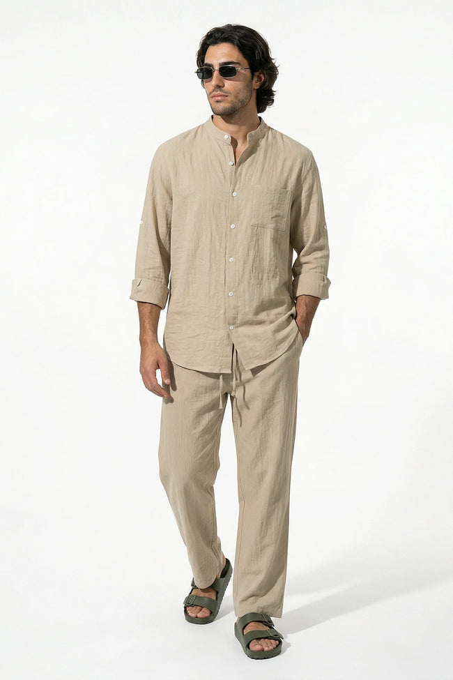 Men's linen co-ord set by FJØRNA featuring a khaki shirt and matching trousers, perfect for summer casual wear.