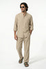 Men's linen co-ord set by FJØRNA featuring a khaki shirt and matching trousers, perfect for summer casual wear.