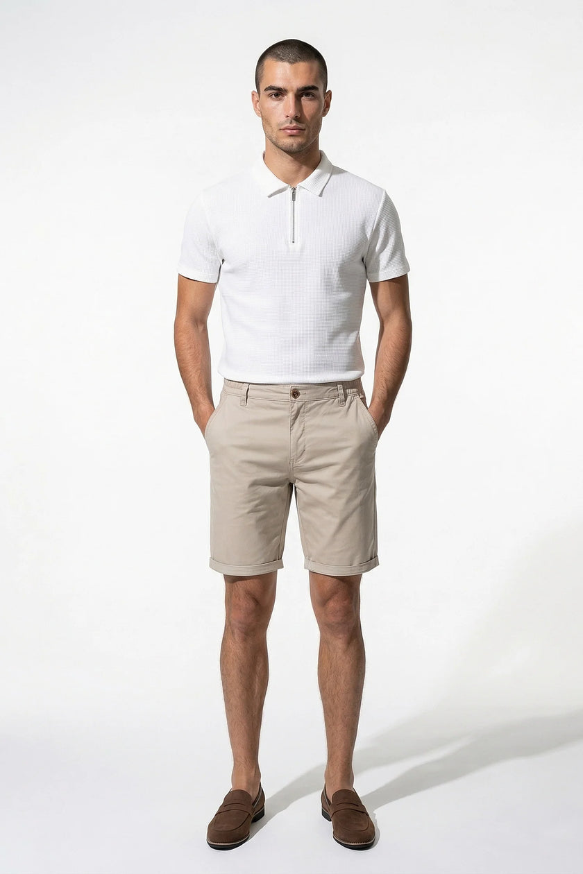 FJØRNA men's cotton chino shorts in champagne color, tailored summer casual pants, full-body view.