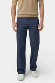 Men's straight fit chino trousers by FJØRNA, made from stretch fabric, tailored for a smart casual look, shown in a neutral color.