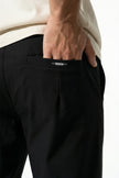 Men's slim fit chino trousers by FJØRNA, black ultra-thin stretch pants with a sleek, modern look and tailored fit.