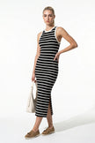 Black ribbed midi dress by FJØRNA, sleeveless, slim fit, casual women’s dress shown full body view.