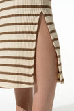FJØRNA ribbed midi dress for women, slim fit, sleeveless, casual style in khaki fabric, close-up view of the dress.