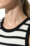 White ribbed midi dress by FJØRNA, sleeveless and slim fit, ideal for casual wear and stylish summer looks.