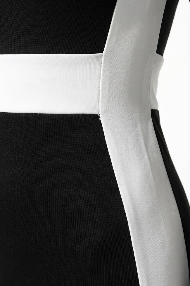 Black and white monochrome bodycon maxi dress for women by FJØRNA, featuring a fitted silhouette and elegant design.
