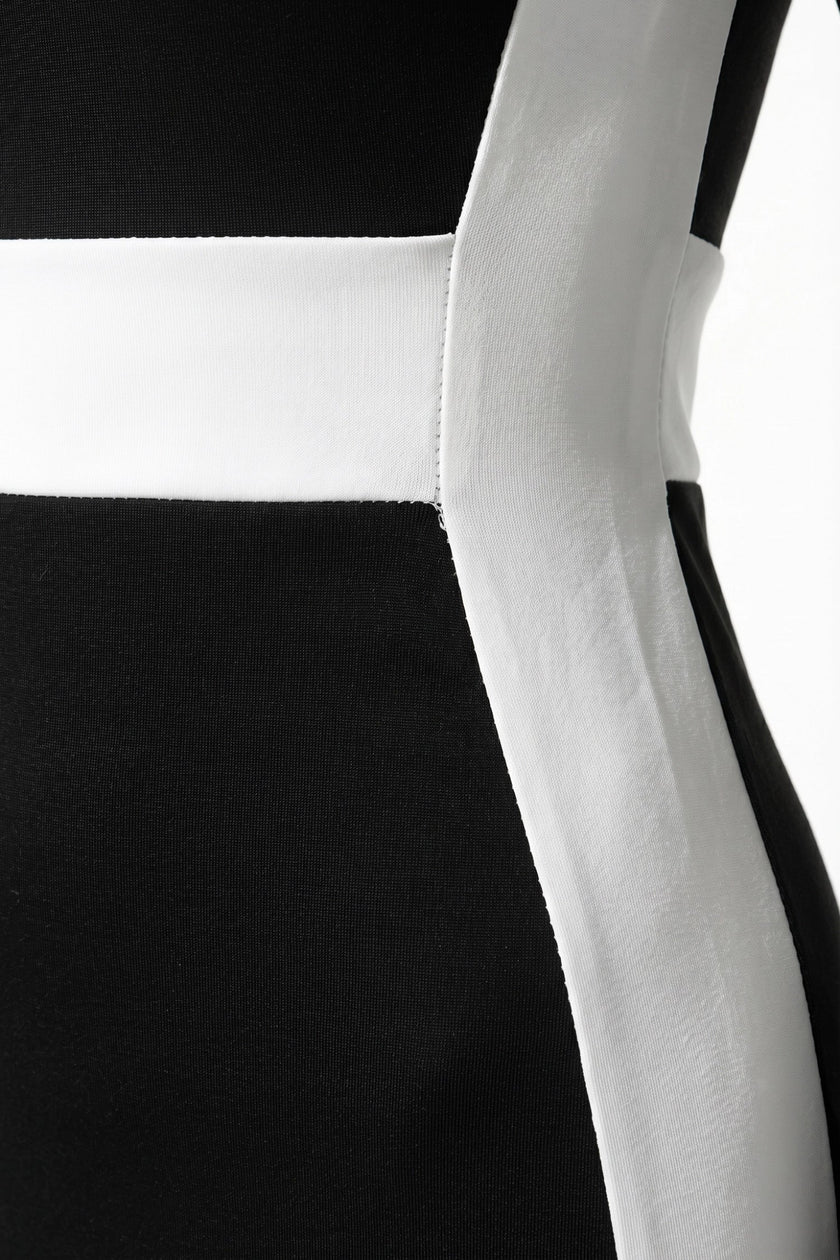 Black and white monochrome bodycon maxi dress for women by FJØRNA, featuring a fitted silhouette and elegant design.