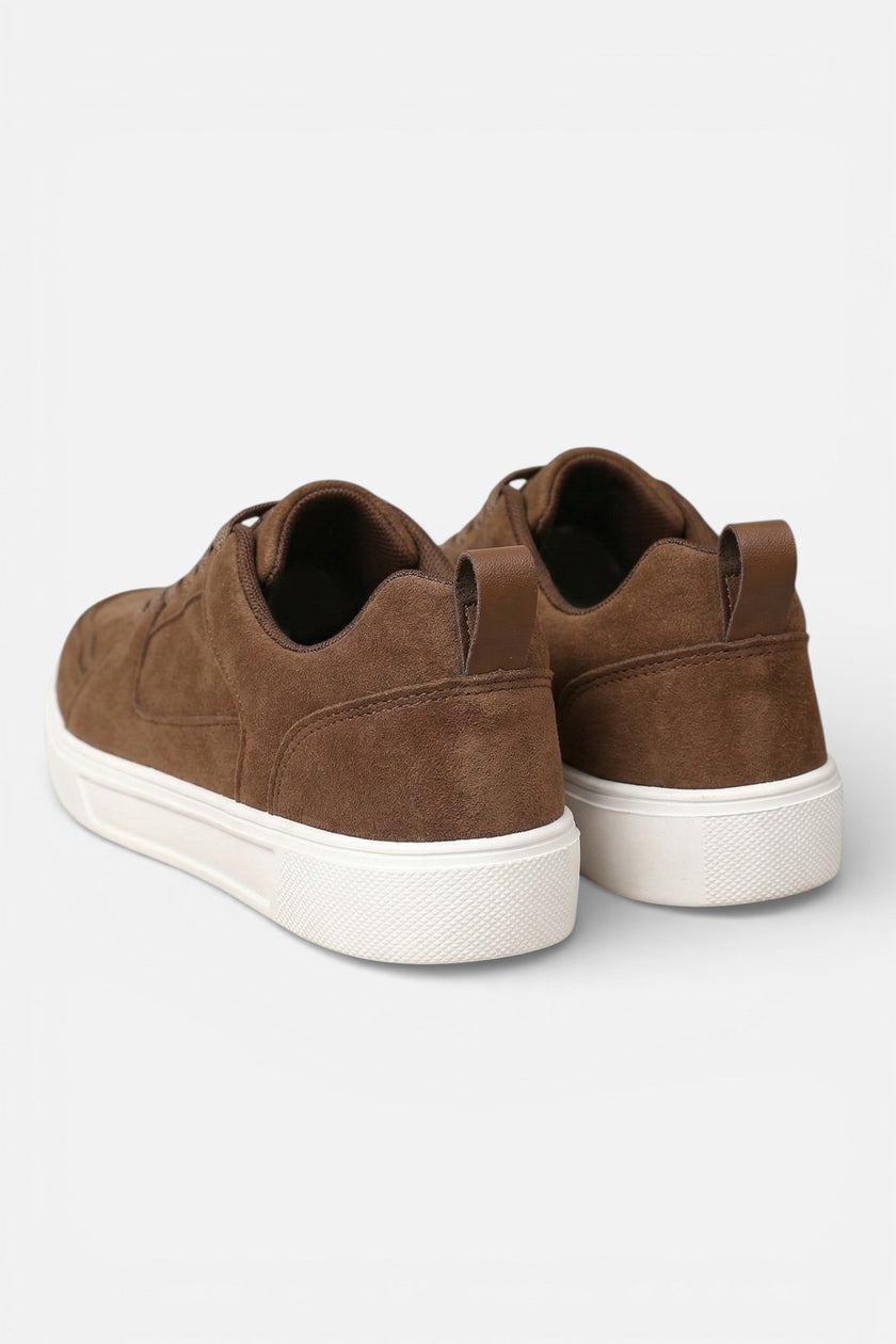 FJØRNA women’s brown casual lace-up trainers, stylish everyday shoes with a comfortable, chic design, shown from a side angle.