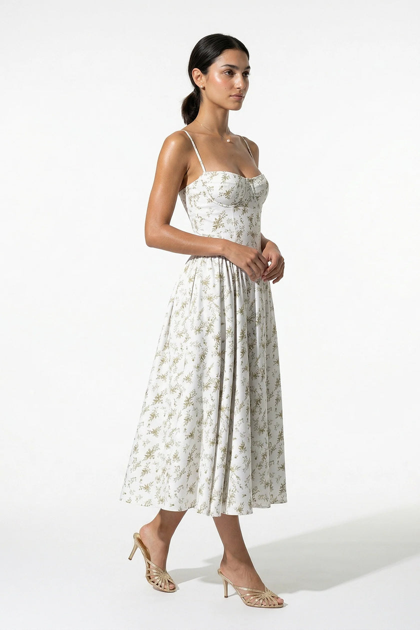 Green floral sleeveless midi dress for women by FJØRNA, lightweight summer dress with a flowing, casual style.