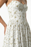 Green floral sleeveless midi dress for women by FJØRNA, lightweight summer dress with a feminine, flowy design.