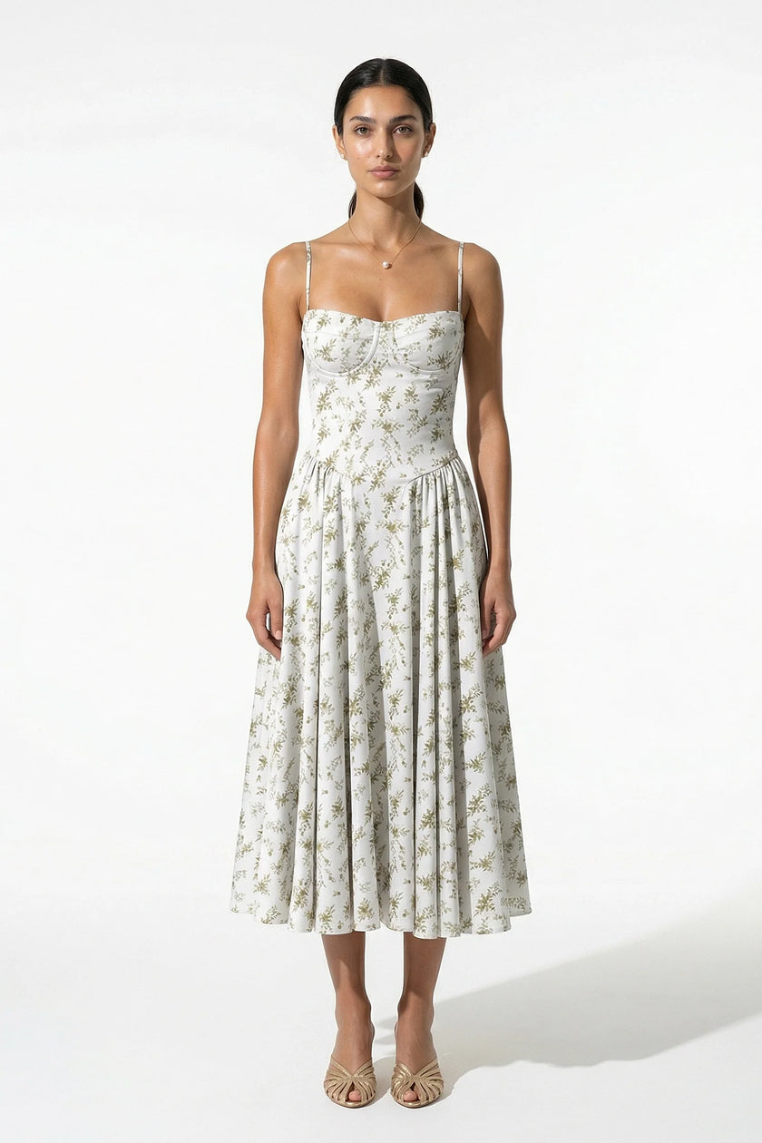 FJØRNA floral midi dress for women, sleeveless lightweight summer dress with green floral pattern on smooth fabric.