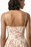 Red floral sleeveless midi dress for women by FJØRNA, lightweight summer dress with a feminine floral pattern.