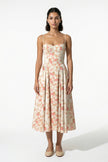 Red floral sleeveless midi dress for women by FJØRNA, lightweight summer dress with a flowing, feminine design.