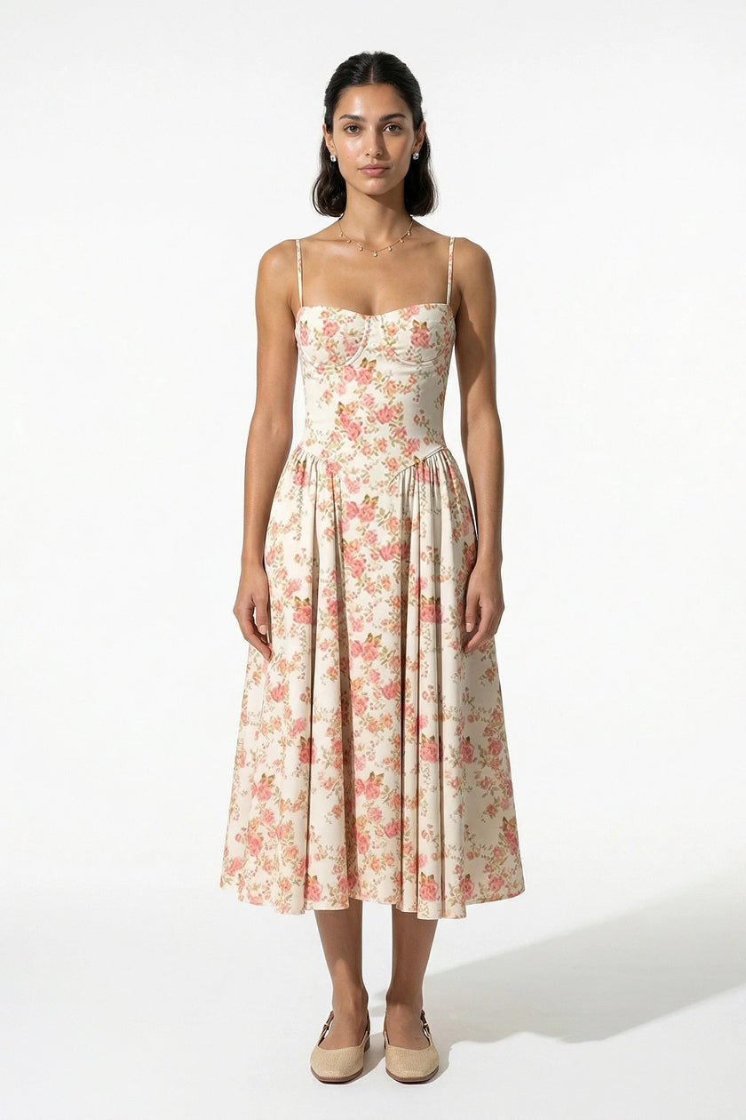 Red floral sleeveless midi dress for women by FJØRNA, lightweight summer dress with a flowing, feminine design.
