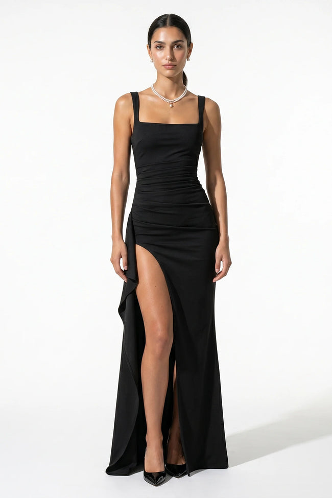 Black high-slit sleeveless maxi dress for women by FJØRNA, featuring a flowy silhouette and elegant design.