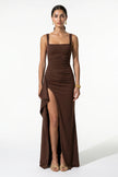 Brown high-slit maxi dress for women with sling design and sleeveless style by FJØRNA, shown on a model.