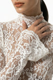 White lace midi dress for women by FJØRNA featuring long sleeves and a fitted silhouette.