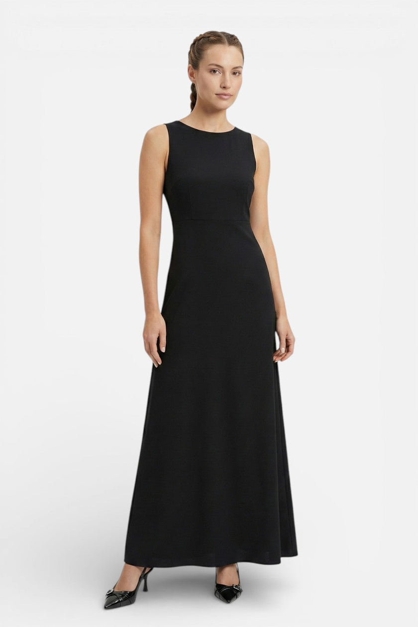 Flowing sleeveless summer maxi dress for women by FJØRNA, featuring a casual, effortless coastal style.