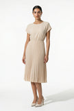 FJØRNA women's apricot pleated midi dress with A-line silhouette and round neckline, full-body view, casual style.