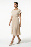 Apricot women's pleated A-line midi dress with round neck, casual style by FJØRNA, perfect for everyday wear