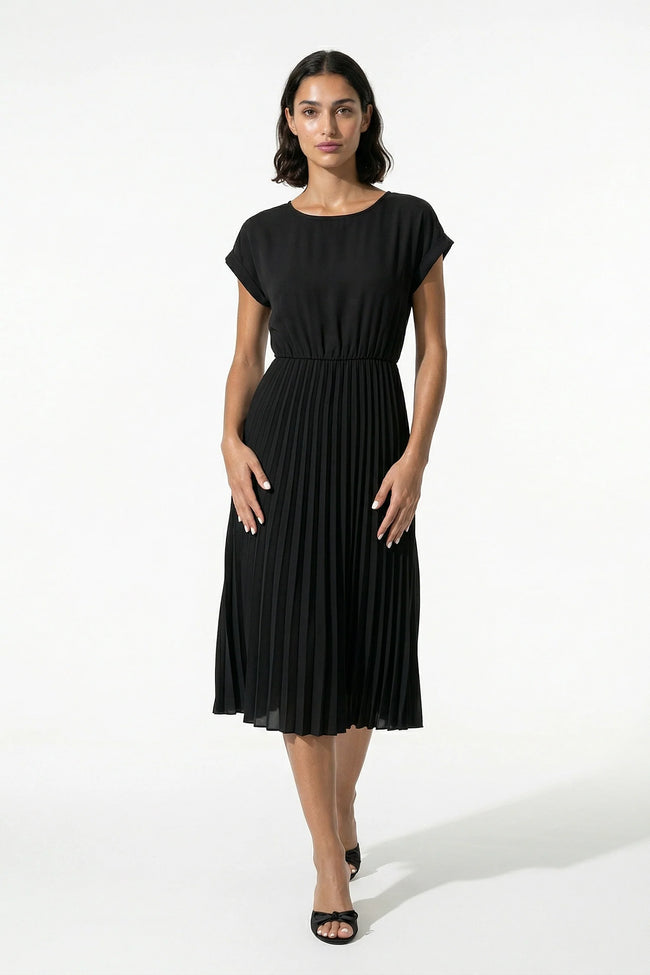 Black FJØRNA women's pleated midi dress with A-line silhouette and round neck, casual style perfect for everyday wear.