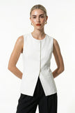 White sleeveless women's fitted waistcoat by FJØRNA, button-front summer vest with tailored fit and casual style.